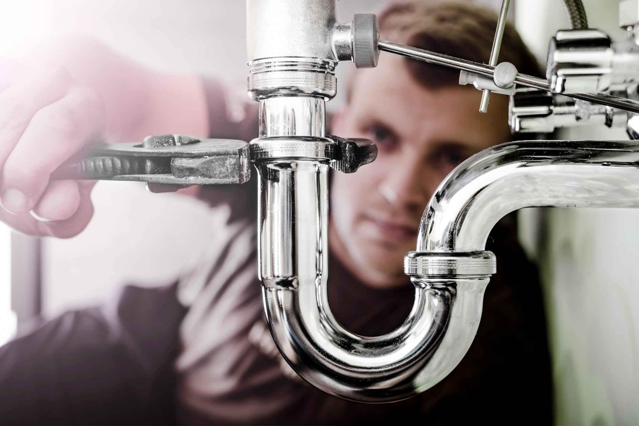 Professional plumber at work